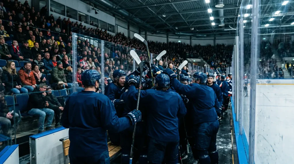 Road team celebrating a critical playoff goal on enemy ice